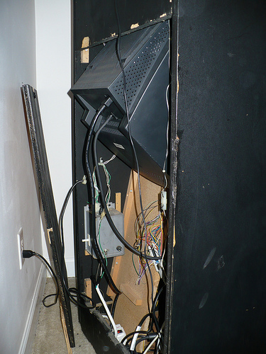 Monitor extends past back of cabinet
